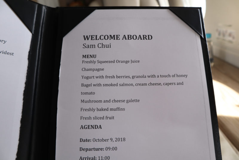 a menu with black paper and black text