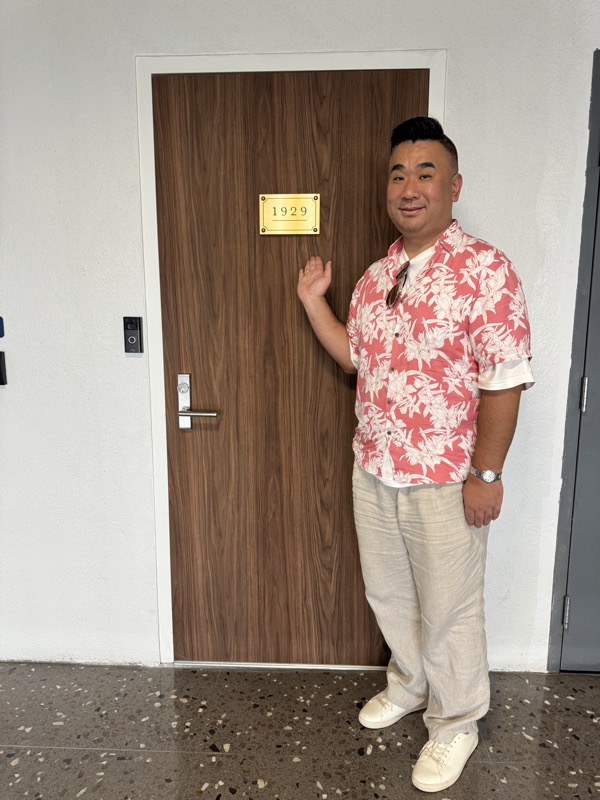 a man standing in front of a door