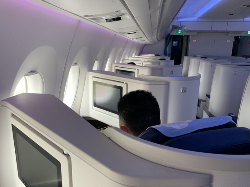 a man sitting in an airplane